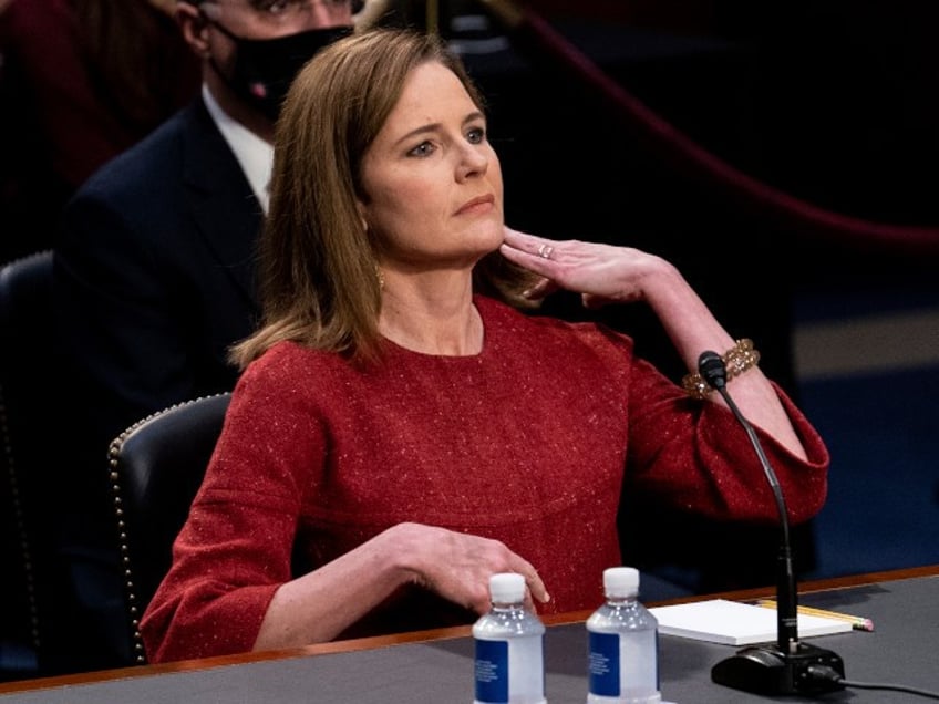 Supreme Court nominee Amy Coney Barrett listens during a confirmation hearing before the Senate Judiciary Committee, Tuesday, Oct. 13, 2020, on Capitol Hill in Washington. (Erin Schaff/The New York Times via AP, Pool)