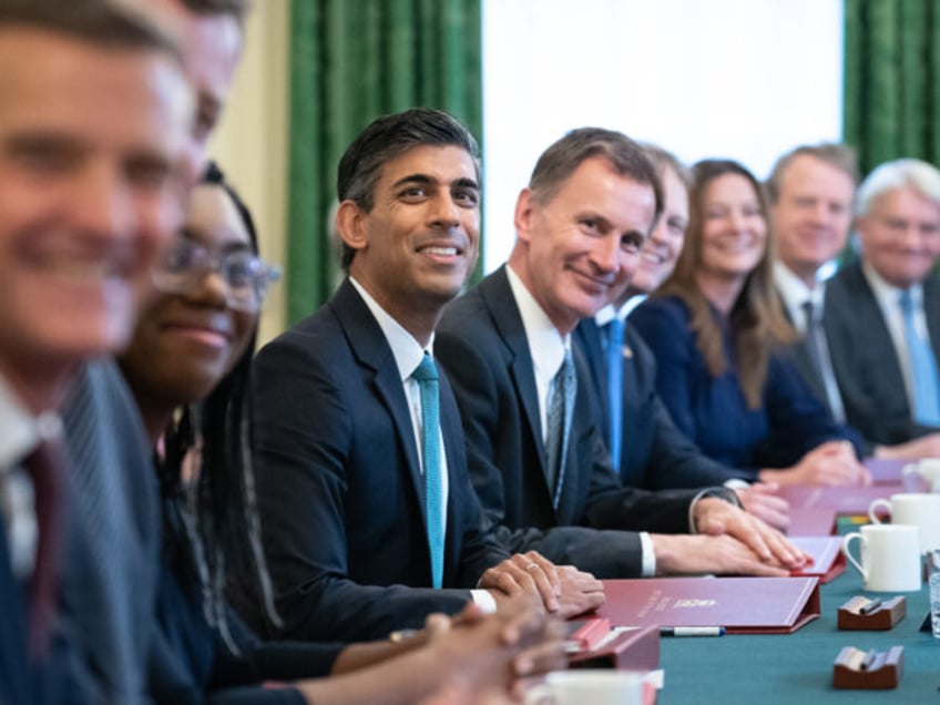 LONDON, ENGLAND - OCTOBER 26: Prime Minister Rishi Sunak (centre), alongside the Chancello