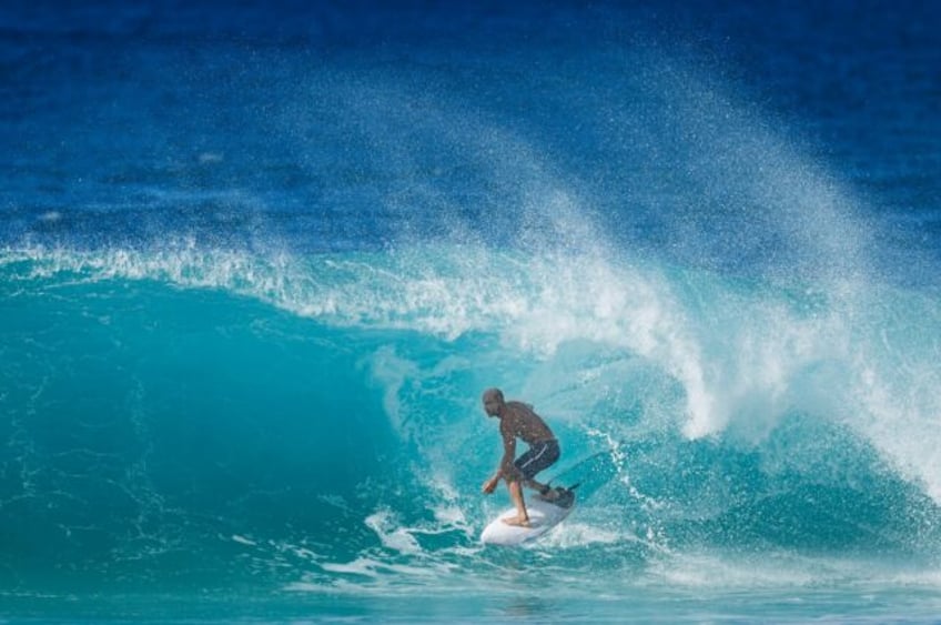 Kelly Slater called Quiksilver co-founder Alan Green a 'great friend and mentor for so man