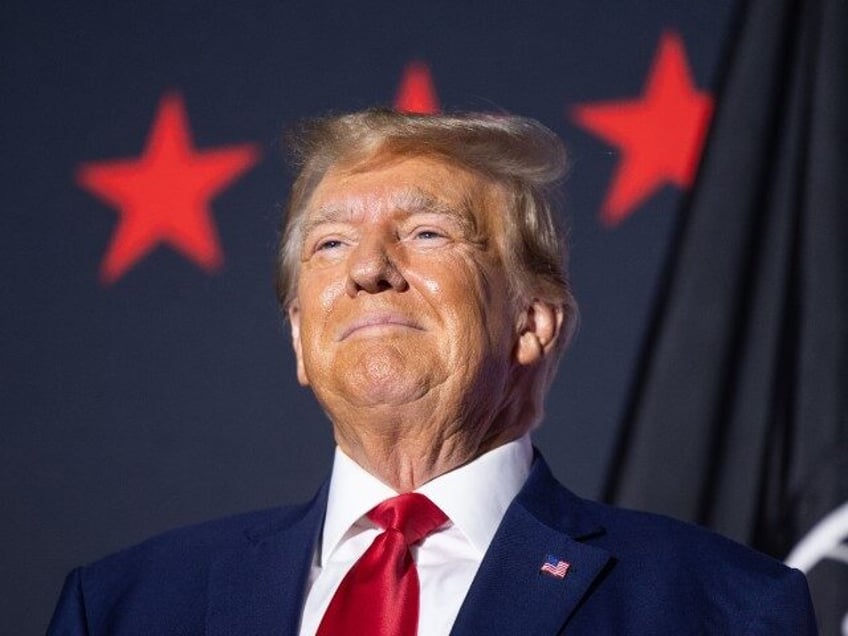 Former President Donald Trump on stage before delivering remarks at Windham High School on August 8, 2023 in Windham, New Hampshire. This is the fourth visit that former President Trump has made to New Hampshire this campaign season. (Scott Eisen/Getty Images)