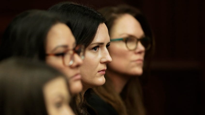 Kirsten Bridegan, the widow of Jared Bridegan watches the suspects in her husband's murder as she sits in the courtroom gallery during Friday's hearing. Shanna Gardner, Mario Fernandez Saldana, and their attorneys had a court hearing in the Duval County Courtroom of Judge London Kite for pre-trial issues regarding attorney-client issues and a possible change of venue on Friday morning, February 16, 2024.