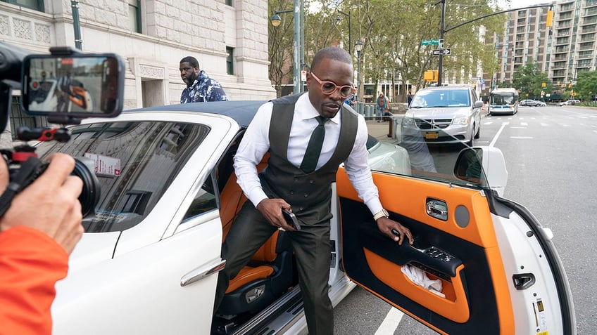 Brooklyn bling bishop gets out of luxury car