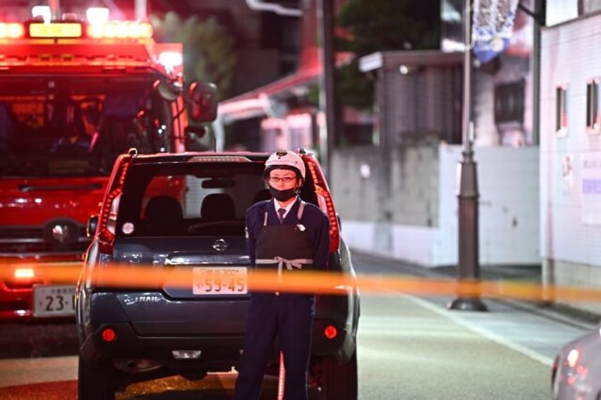 suspected gunman takes hostages in japan