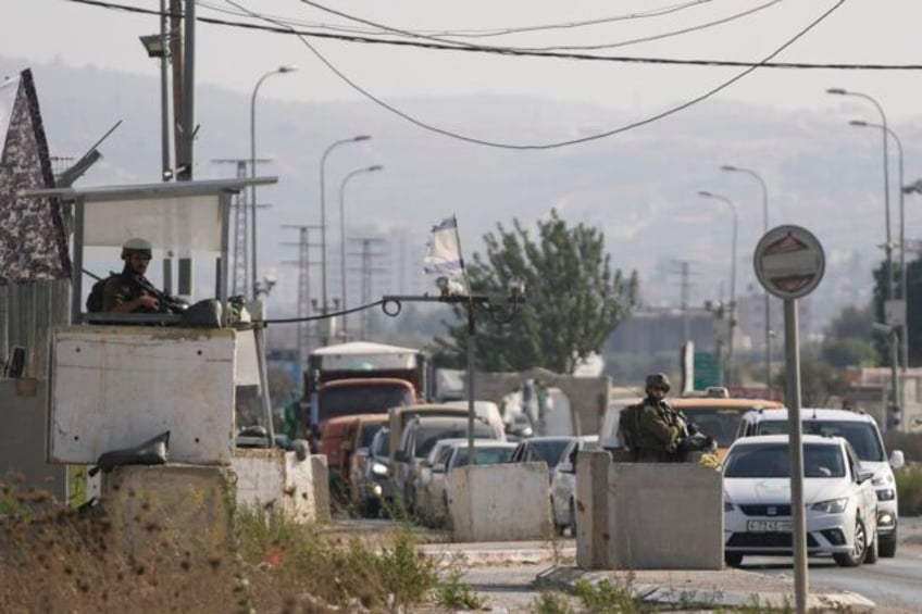 suspected palestinian shooting attack at west bank car wash kills 2 israelis