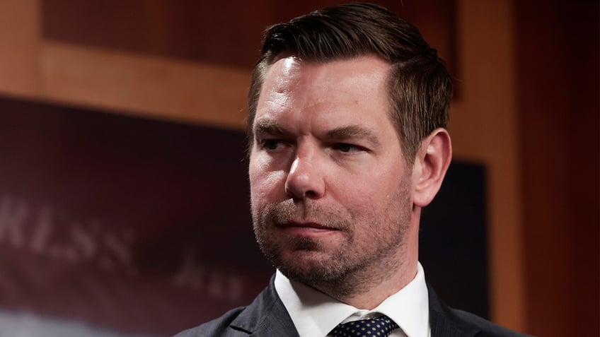 Rep. Eric Swalwell, D-Calif., listens as Sen. Jack Reed, D-R.I., speaks during a news conference on the introduction of their Protection from Abusive Passengers Act at the U.S. Capitol Building on April 6, 2022 in Washington. (Photo by Anna Moneymaker/Getty Images)