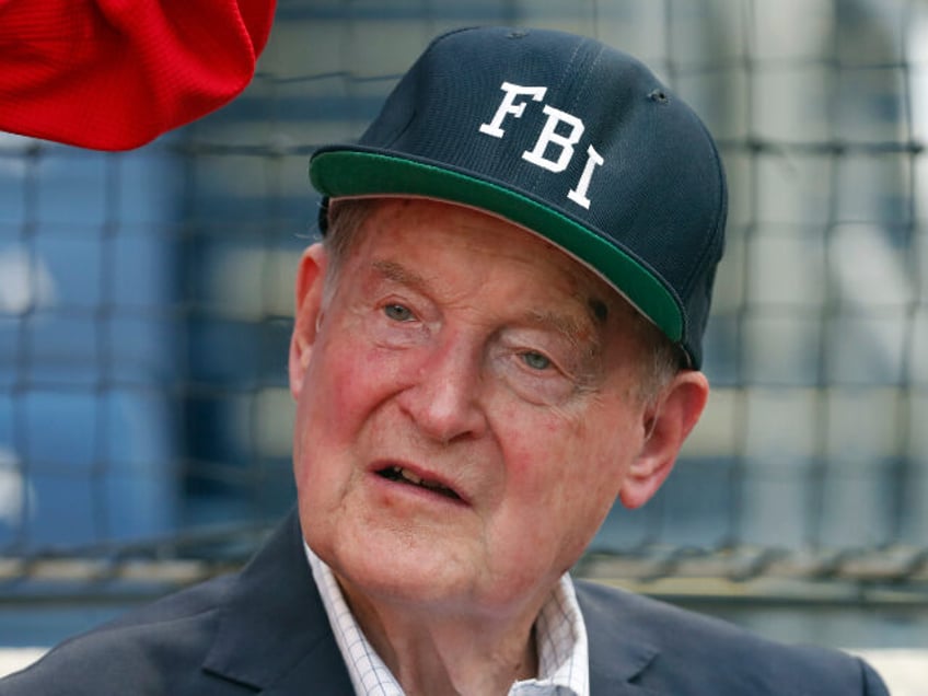 Judge William Webster, former FBI and CIA director, stands during the national anthem befo