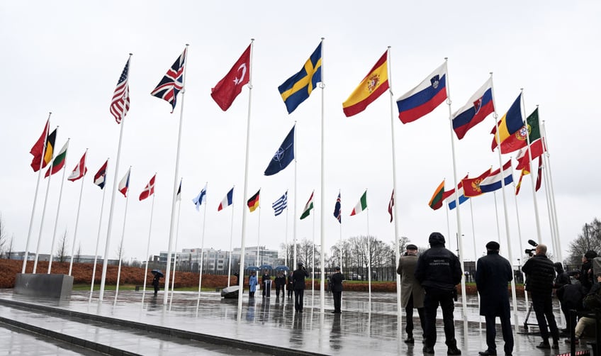 swedish flag raised at nato headquarters for first time