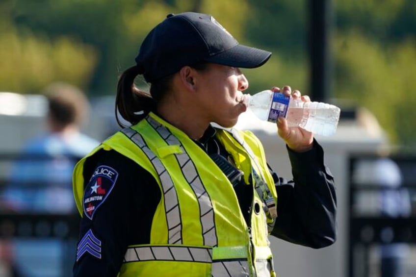 sweltering temperatures bring misery to large portion of central us setting some heat records