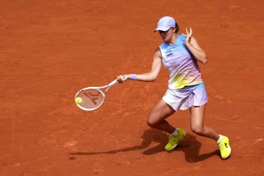 Iga Swiatek is trying to become the first woman in the Open era to win four successive Rol