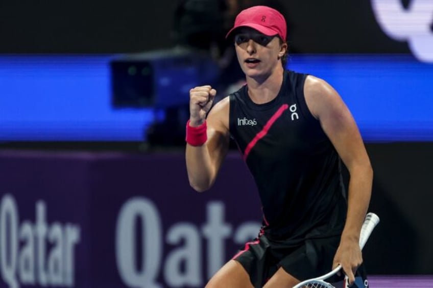 Moving on: Iga Swiatek on her way to victory over Ekaterina Alexandrova