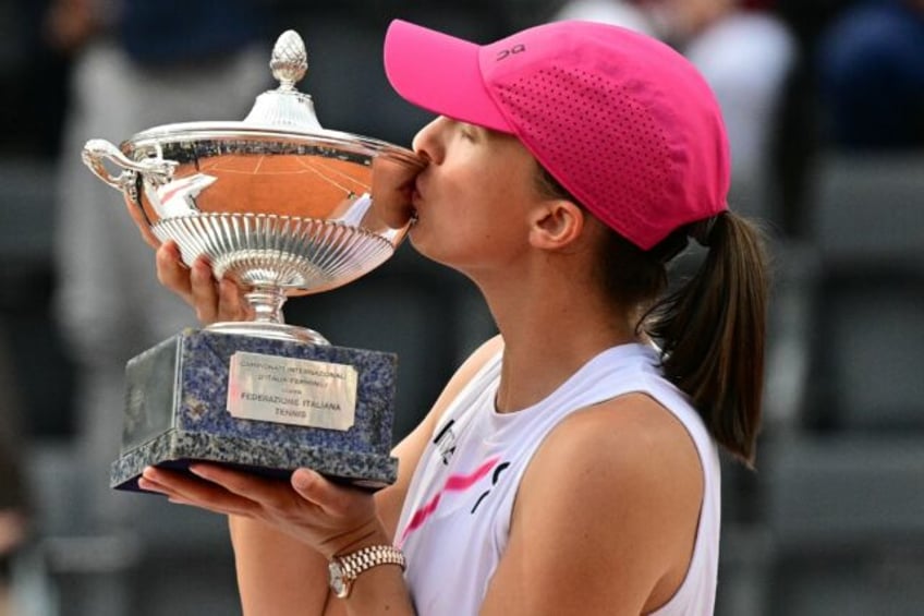 Iga Swiatek warmed up for Roland Garros by adding the Rome Open trophy to her Madrid title