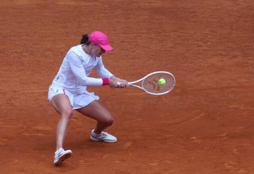 Iga Swiatek beat Madison Keys in straight sets to reach her second consecutive Madrid Open