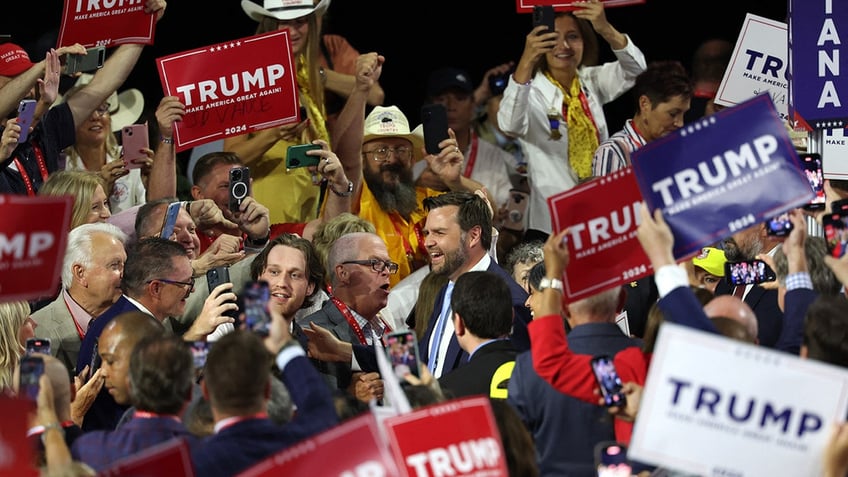 JD Vance is greeted by supporters as he arrives for Day 1 of the Republican National Convention