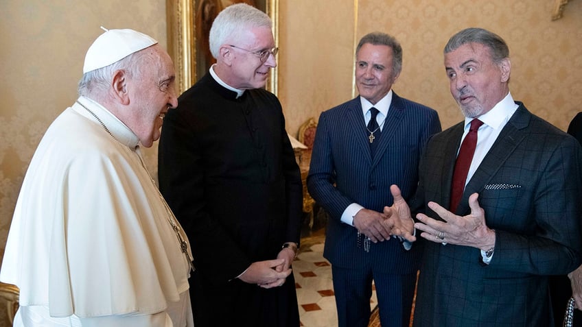 sylvester stallone and pope francis jokingly face off in vatican city