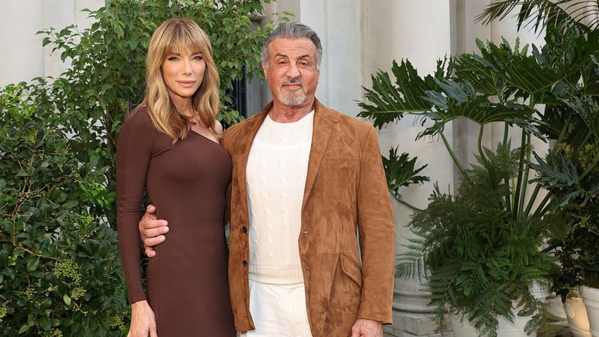 Jennifer Flavin posing with Sylvester Stallone