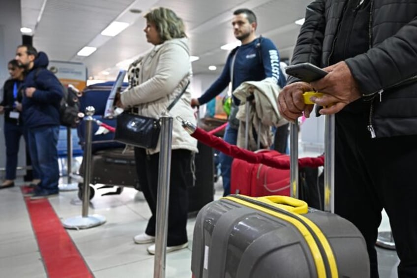 Travellers at Damascus airport on January 7, 2025