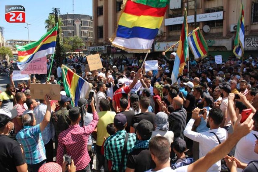 syria protests spurred by economic misery stir memories of the 2011 anti government uprising