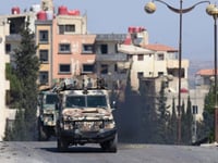 Syria says local factions to secure violence-hit Sweida