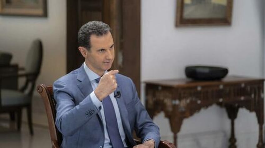 syrias president assad confirms rare direct talks with washington