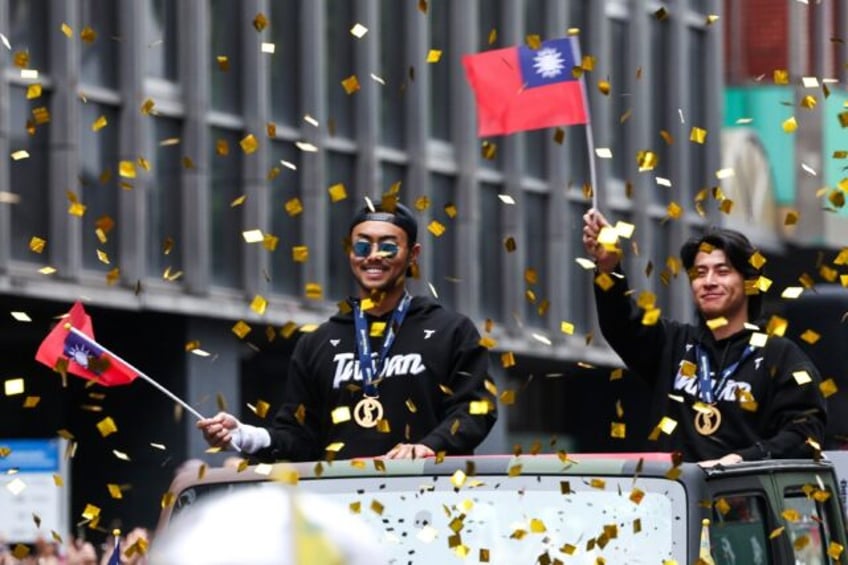 Taiwan's baseball team receive a rapturous welcome back home after their historic victory