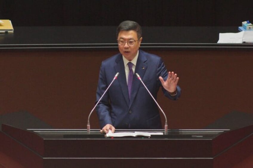 Taiwan's Premier Cho Jung-tai delivers his first policy address during a session at the Pa