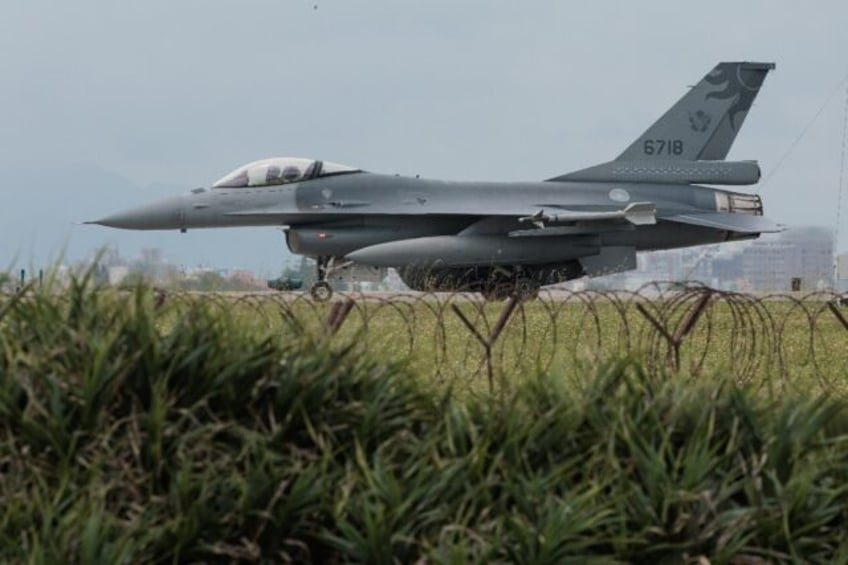 A Taiwanese Air Force F-16 fighter jet taxis after landing at an air force base in Taiwan