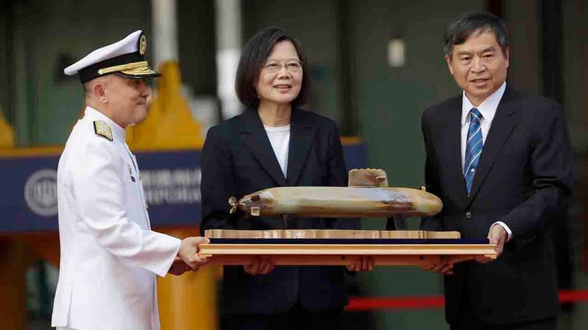 taiwan unveils first domestically made submarine as tensions with china grow