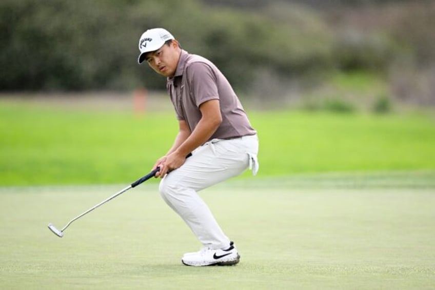 Kevin Yu of Taiwan reacts to a missed putt on the way to the first-round lead in the US PGA Tour Farmers Insurance Open at Torrey Pines in La Jolla, California