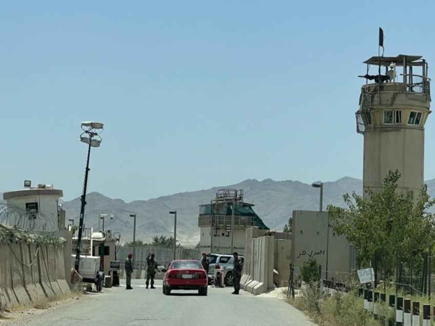 KABUL, AFGHANISTAN_JULY 05: Afghan National Army inspect a vehicle who keep watch after th