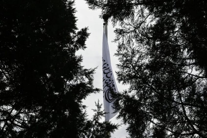 A Taliban flag flies at the Afghan embassy in Beijing. China, Pakistan and Russia are amon