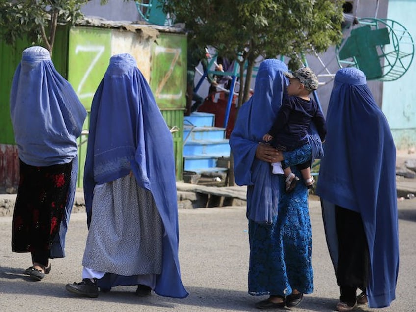 taliban on banning women in public value of a woman decreases by men looking at her