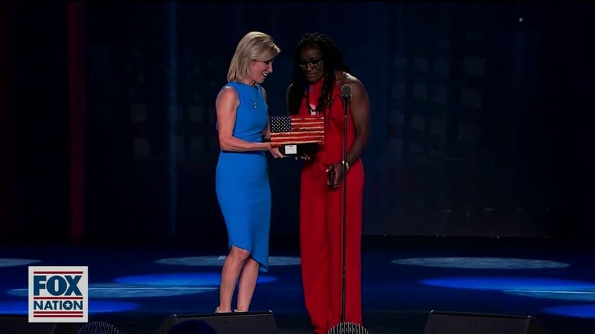 tamyra mensah stock first black female wrestling olympic gold medalist wins most valuable patriot