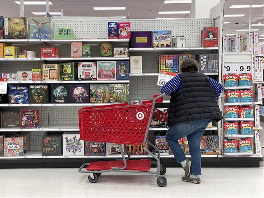 SAN FRANCISCO, CALIFORNIA - DECEMBER 15: A Target customer looks at a display of board gam