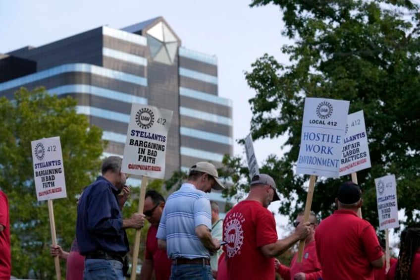 targeted strikes may spread to other states and cities as midday deadline set by auto workers nears