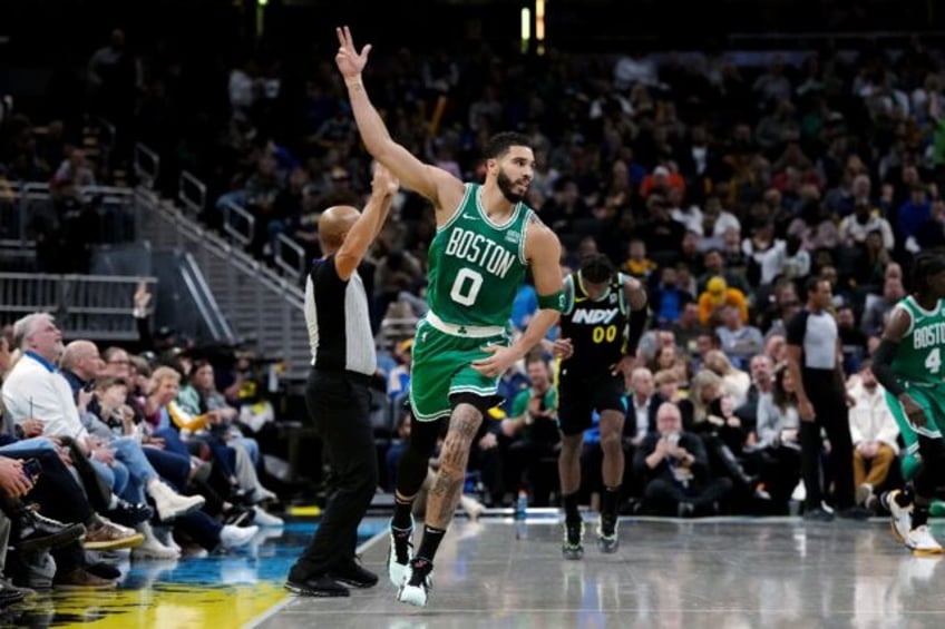 Boston's Jayson Tatum celebrates a basket in the Celtics' NBA victory over the Indiana Pacers