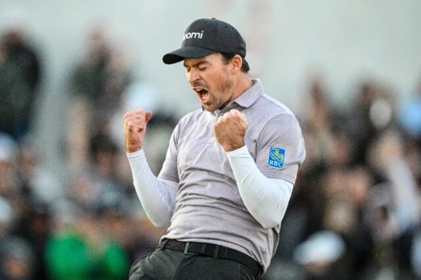 Canada's Nick Taylor celebrates making his birdie putt on the second playoff hole to win t