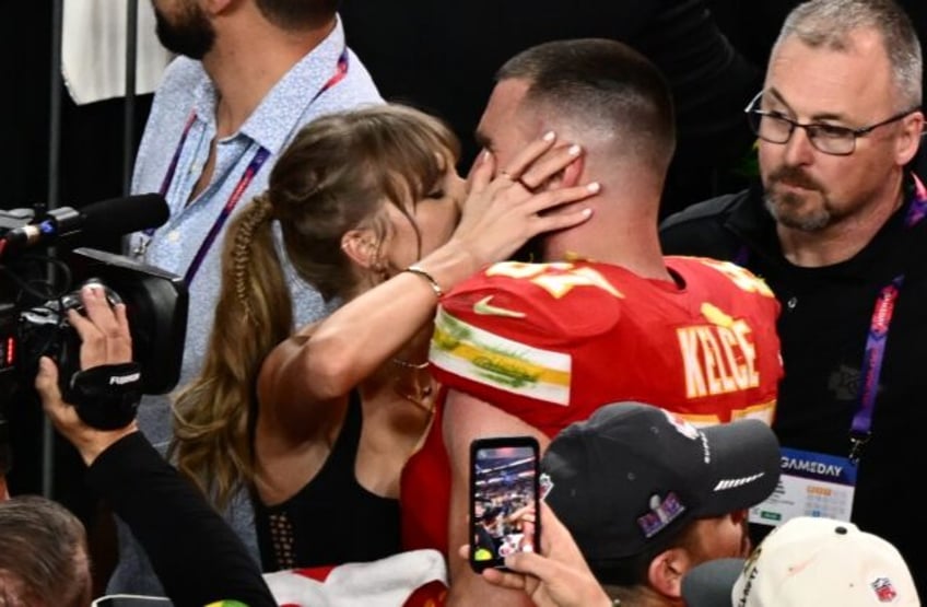 Taylor Swift, shown here kissing Travis Kelce at the 2024 Super Bowl, was spotted at Coach