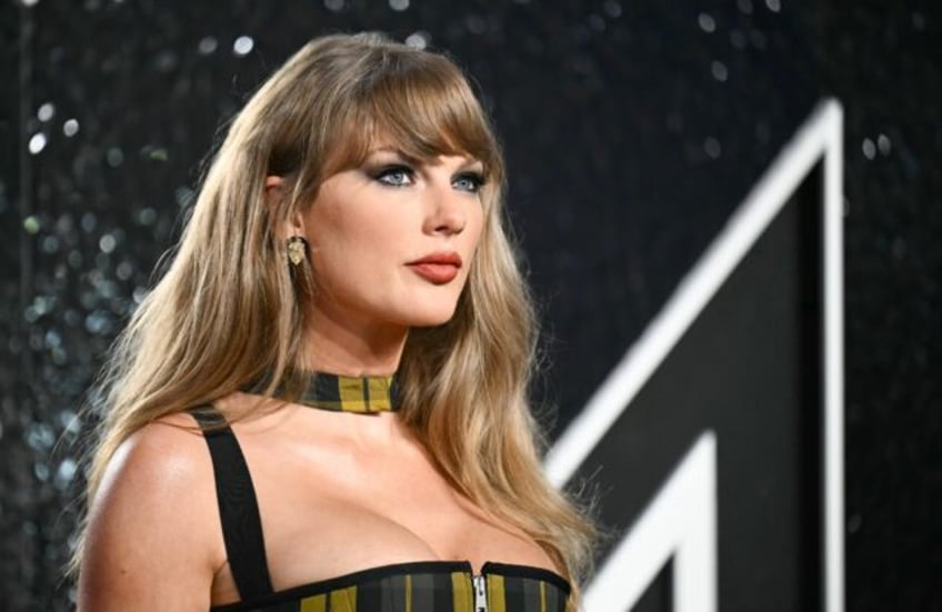 Taylor Swift arrives to attend the MTV Video Music Awards at UBS Arena in Elmont, New York