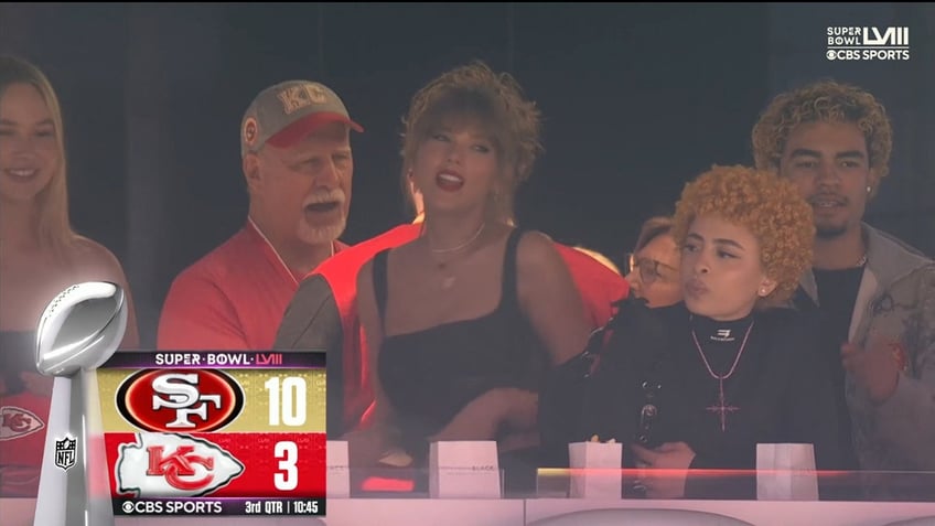 Taylor Swift singing along to music during Super Bowl LVIII