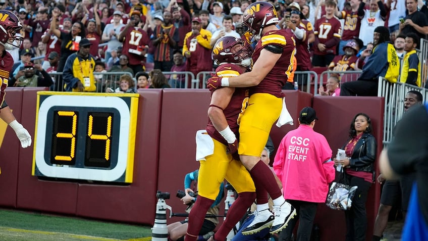 Ben Sinnott celebrates a TD pass