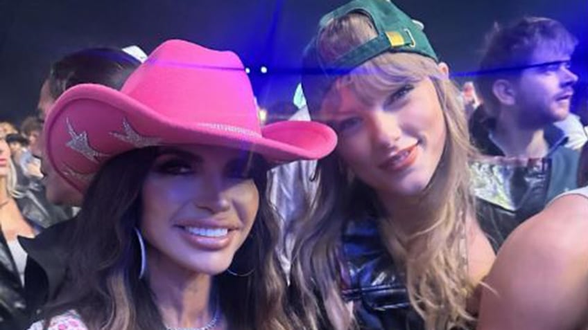 Teresa Giudice wears a pink cowboy hat next to Taylor Swift in a backwards green baseball hat.