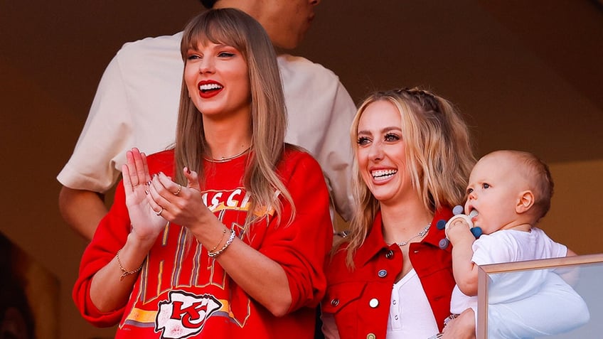 taylor swift sports travis kelces football jersey number on friendship bracelet at chiefs game