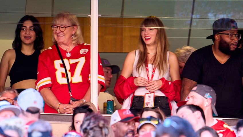 taylor swift time person of the year says travis kelce won her over on his new heights podcast