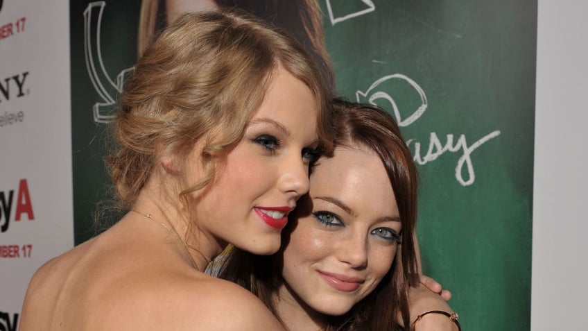 Taylor Swift and Emma Stone at a premiere