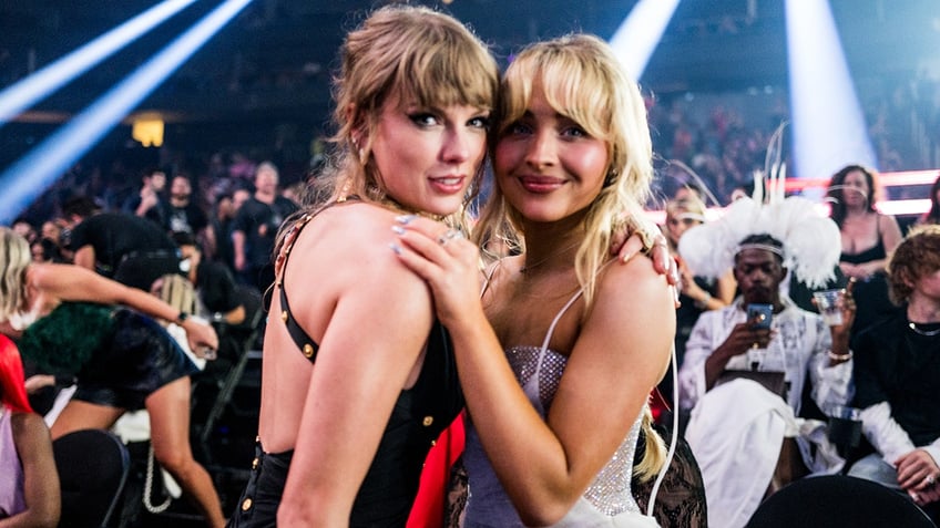 Taylor Swift and Sabrina Carpenter hug