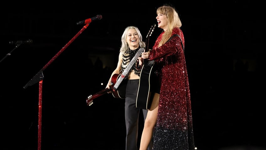 Phoebe Bridgers and Taylor Swift on stage