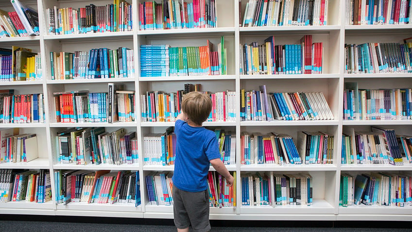 boy in library