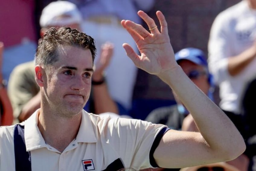 tearful isner signs off with us open loss