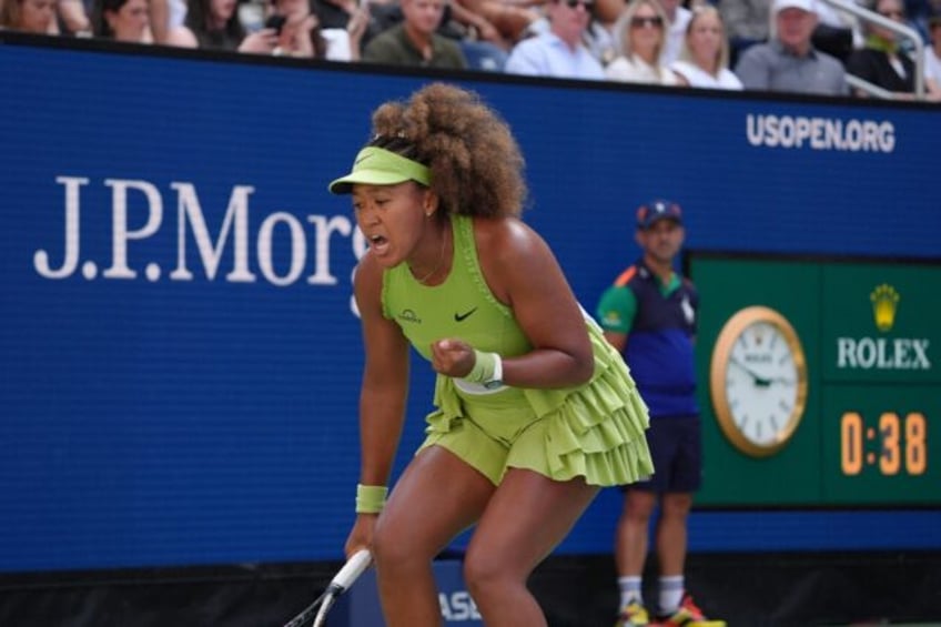 Japan's Naomi Osaka celebrates a point in he US Open first-round win over Latvia's Jelena