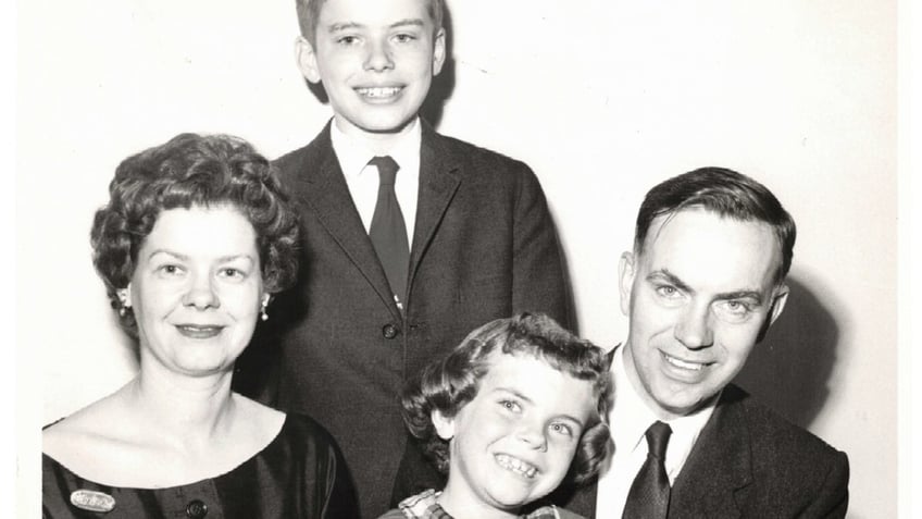 Edna Cowell Martin pictured as a child with her parents and brother, John